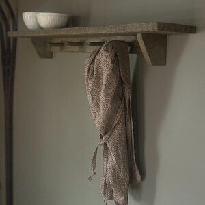 Primitive Farmhouse Peg Board Shelf Has whittled pegs.